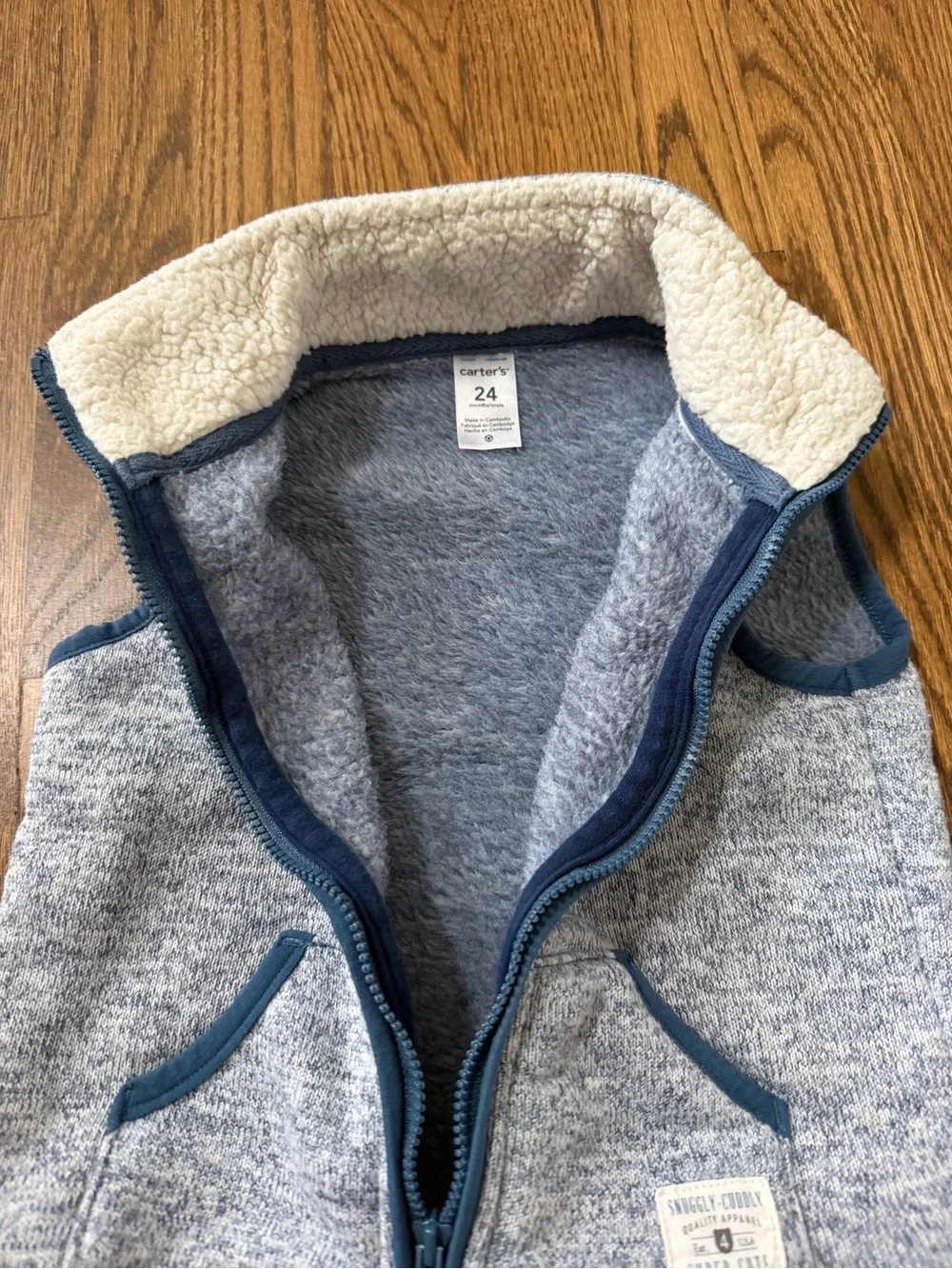 Carter’s blue knit vest, size 24M